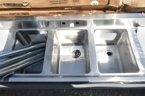Brand new Regency 600B31014213 3-bowl stainless steel underbar sink with two drainboards, 60" x 18 3/4", scratch and dent condition.