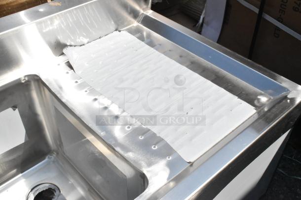 BRAND NEW Regency 3 Bowl Underbar Sink with 2 Drainboards. Scratch and dent condition. 60" x 18 3/4".