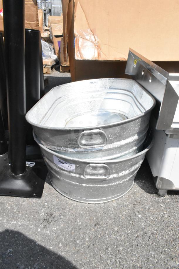 Brand new Behrens hot-dipped steel oval tubs, 23 3/4" x 42 3/4" x 10 1/2", labeled scratch and dent, quantity two.