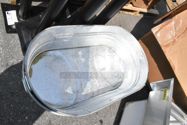 Behrens hot-dipped steel oval tub, 23 3/4" x 42 3/4" x 10 1/2", brand new with minor dents.