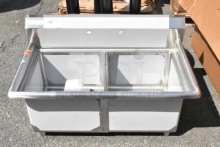 Brand new Steelton 522CS21717 stainless steel two-compartment sink, 39.5", 18 gauge, scratch and dent, no legs.