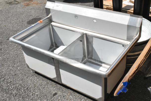 Brand new Steelton 522CS21717 39.5" stainless steel two-compartment sink, 18 gauge, 17"x17"x12", scratch and dent condition. No legs.