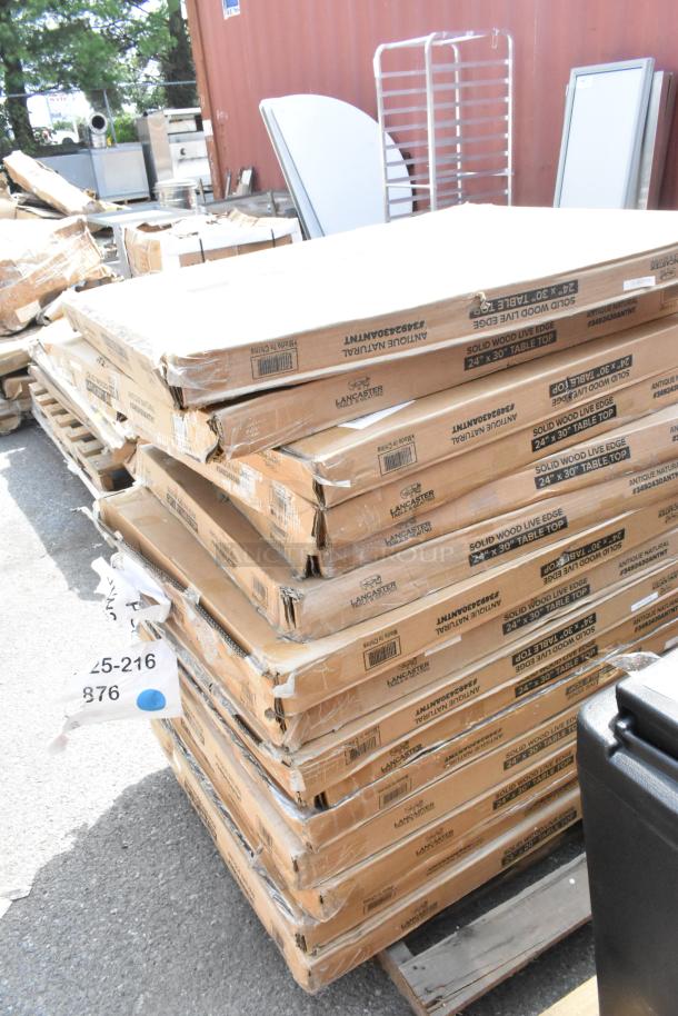 Stack of 15 Lancaster Table & Seating 24"x30" live edge wood table tops in boxes with Honey Maple finish, new with minor defects.