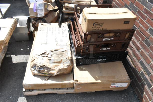 Ten items including wire shelves and ergonomic platform truck in various boxes, some marked "Baker's Lane," labeled "scratch and dent."