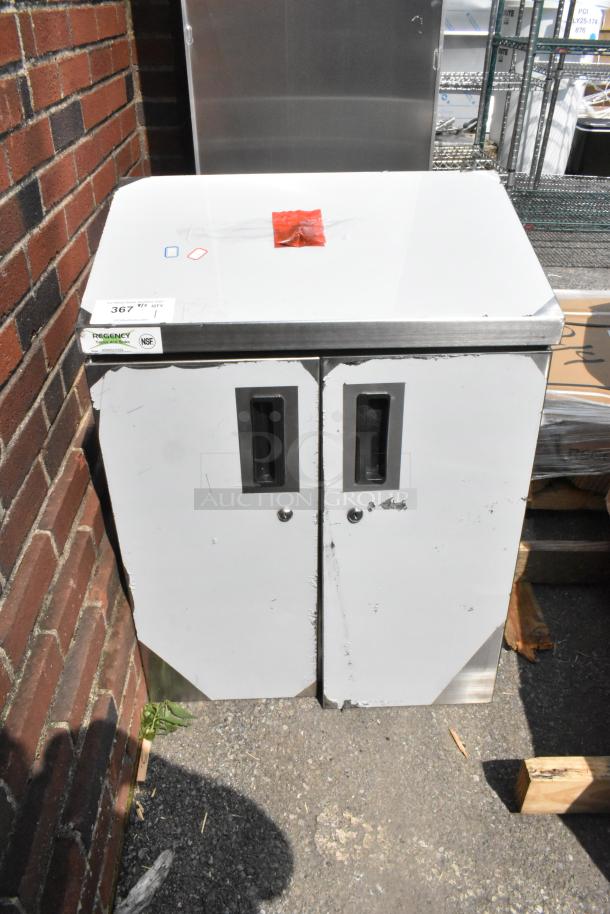 Brand new Regency 600WCH1524 24" stainless steel wall cabinet with hinged doors. Visible scratches and dents. NSF certified.