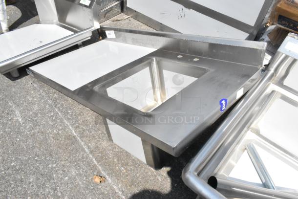 Brand new Regency 600ST2448R stainless steel work table with sink, 24"x48", 16 gauge, no legs, minor scratches.