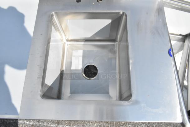 Regency 600ST2448R stainless steel work table with sink, 24"x48", 16 gauge, scratch and dent condition, no legs.