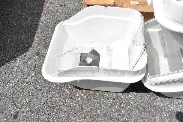 Brand new white poly ingredient bin with minor scratches and dents, ideal for storage. Three bins available for auction.