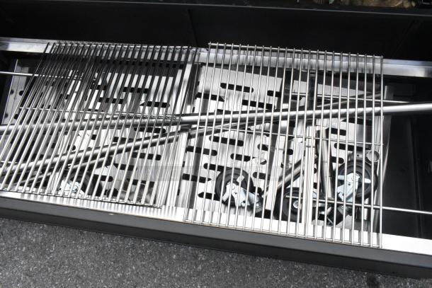 Brand new Backyard Pro 60" charcoal/wood smoker grill, model 554SMOKR60AS, with adjustable grates, slight imperfections.