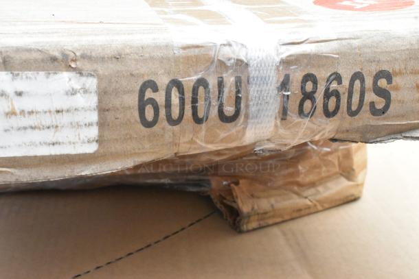 Cardboard box labeled "600U 1860S," containing scratch and dent stainless steel items. Model: Backyard Pro 554SMOKR60AS.