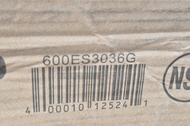 Barcode labeled "600ES3036G" on cardboard box, indicating item specifications or model details.
