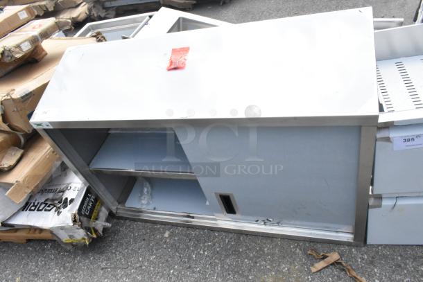 BRAND NEW SCRATCH AND DENT Regency 600WCS1548 48" stainless steel wall cabinet with sliding doors, slight exterior marks.