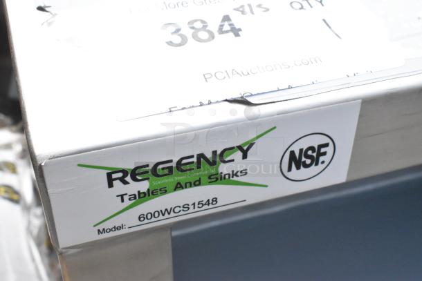 BRAND NEW Regency 600WCS1548 stainless steel wall cabinet, scratch and dent, 48", sliding doors, NSF certified, labels visible.