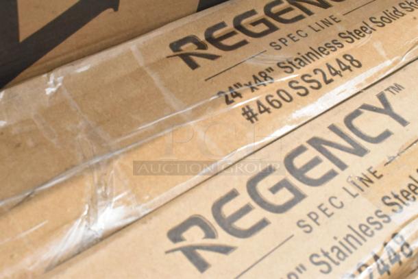 Regency 24"x48" stainless steel solid shelves in packaging, model #460SS2448. Scratch and dent condition.