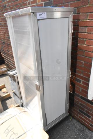 Brand new Regency 600AEC1840GD 40 pan enclosed bun rack with clear acrylic door, stainless steel, scratch and dent condition.