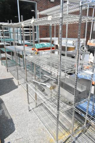 Metro chrome 4-tier wire shelving unit with contents including stainless steel speedwells. Buyer must dismantle.