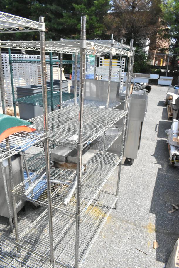 Metro chrome 4-tier wire shelving unit with stainless steel speedwells. Buyer must dismantle for shipping.