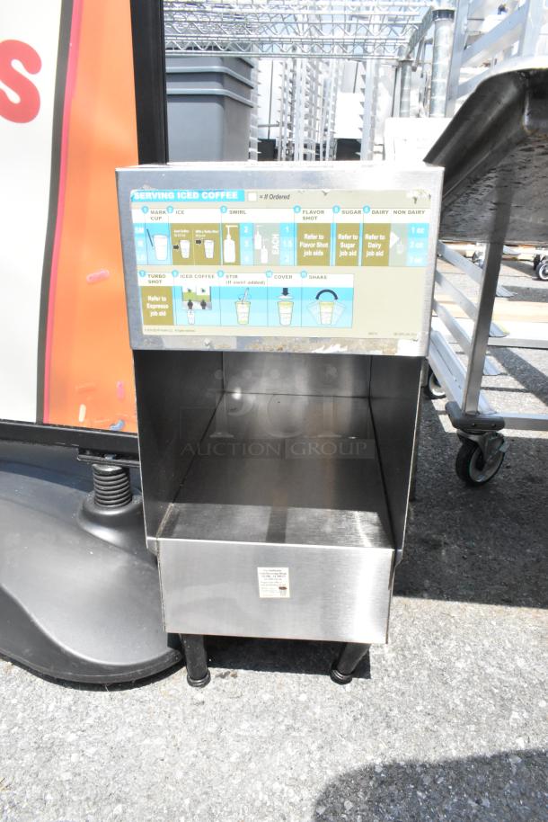 Bunn ICDD-3 stainless steel dispenser with instructions on iced coffee serving, sturdy design, used condition.