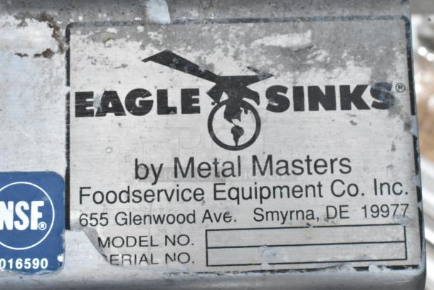 Eagle Sinks label showing brand details; NSF certified. No visible model or serial number. Stainless steel construction.