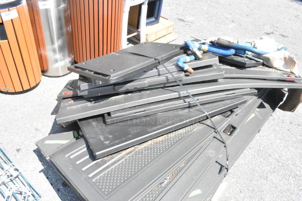Lot of poly cabinet parts, including assorted panels and tubes. Condition appears used. Suitable for assembly projects.