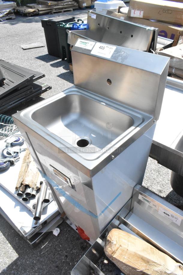 Brand new Regency 600HS17FTPD hands-free hand sink with pedestal base, showing minor scratches. Stainless steel finish.