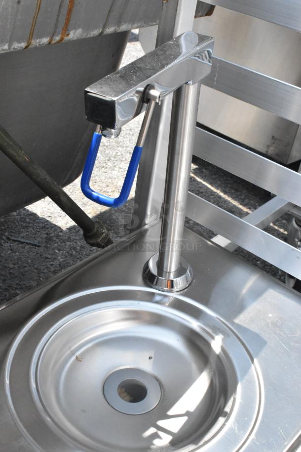 Stainless steel drop-in ice bin and water dispenser, brand new condition, minor scratches, blue handle detail.
