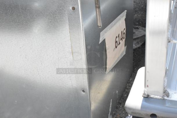 Stainless steel drop-in ice bin and water dispenser, brand new with visible scratches and dents, marked with number 6146.