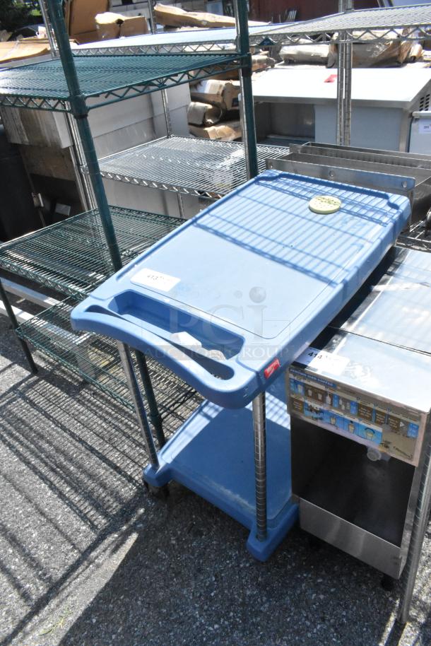 Metro Blue Poly 2 Tier Cart on commercial casters, sturdy design, good condition, visible Metro branding on handle.