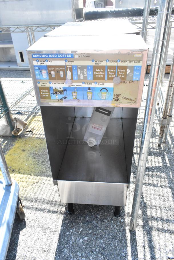 Bunn ICDD-3 stainless steel commercial countertop dispenser stand with iced coffee instructions panel, in used condition.