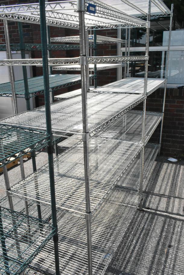Chrome finish 5 tier wire shelving unit in excellent condition, with adjustable shelves. Buyer must dismantle for shipping.