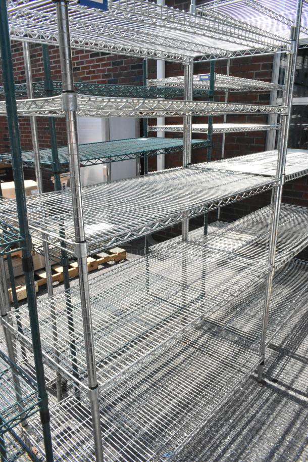 Chrome finish 5-tier wire shelving unit, in used condition. Note: Buyer must dismantle for transport; consider freight costs.