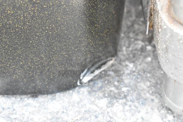 Brand new scratch and dent bin with center hinge lid; visible dent at the bottom side. Durable material, textured finish.