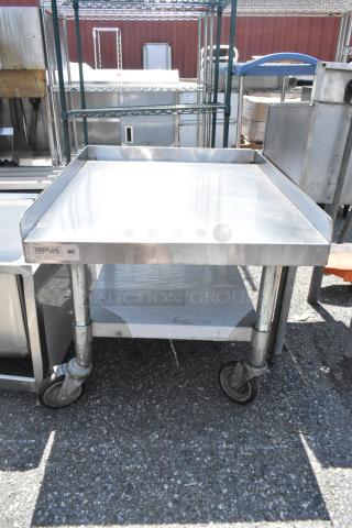 PrepLine PES-3024 stainless steel equipment stand, metal under shelf, on commercial casters, with visible NSF label.