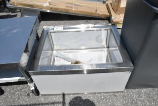 Brand new Regency 600SM202812 mop sink, 33" stainless steel, 16-gauge, one compartment. Size: 28"x20"x12". Some dents visible.