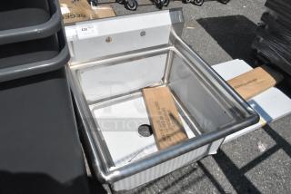 Brand new Steelton 522CS12424 commercial sink, 18-gauge stainless steel, 24"x24"x12" bowl, no drainboard, some scratches.