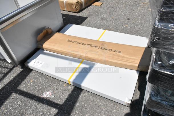 BRAND NEW SCRATCH AND DENT Regency 600T2430G work table, 24"x30" stainless steel, 18-gauge, with galvanized legs, packaged.