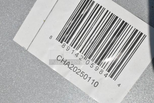 Barcode with number 889142059844 and code CHA20250110 on a metal surface.