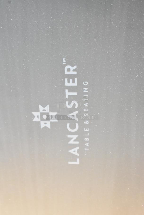 Lancaster Table & Seating logo on metal surface. New condition, part of scratch and dent auction items.