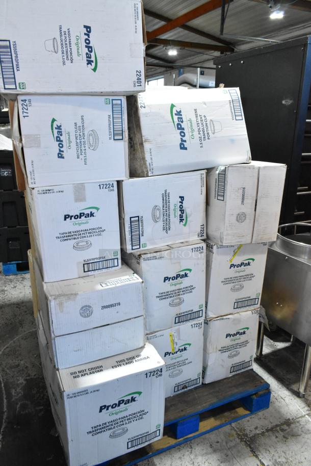 Stack of 30 scratch and dent boxes with ProPak 22401 polystyrene cups, 17224 lids, and red diffusers, on warehouse pallet.