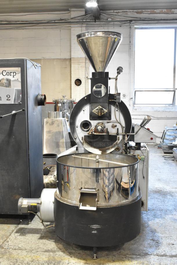 US Roaster Corp metal commercial coffee roaster, 23 kilo, natural gas, 208-230/460V, 3-phase, reflective body.