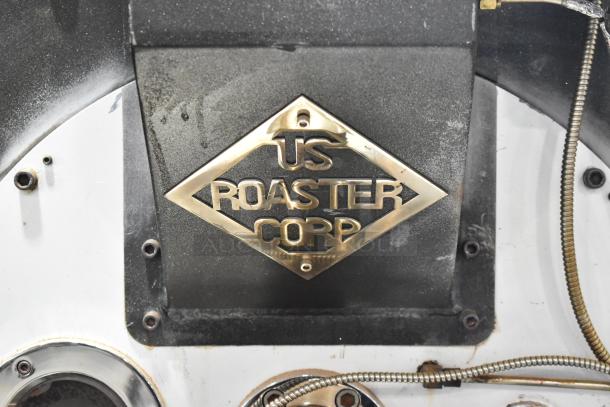 US Roaster Corp commercial 23 kilo coffee roaster, metal, natural gas powered, visible brand badge, 208-230/460V, 3 phase.