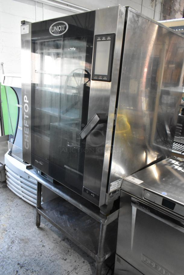 2018 Cadco Unox XAVC-10FS-GPR stainless steel combi oven, 49,260 BTU, commercial half size, visible controls and handle.