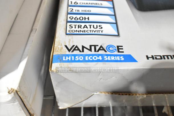 Damaged box for Vantage LH150 ECO4 Series DVR with visible scratches and dirt, indicating wear.