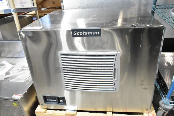 Scotsman MC0330SA-1A stainless steel ice machine, 2025 model, 400 lb capacity, 115V, 1 Phase, dented corner visible.