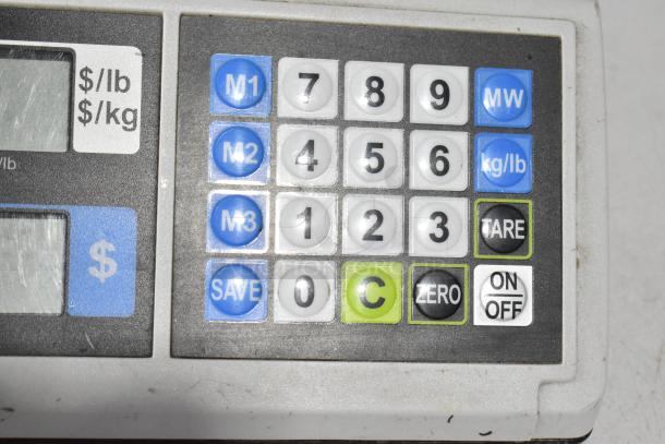 2018 CAS ER JR (CB) countertop food portioning scale, keypad view with mode and function buttons, used condition.