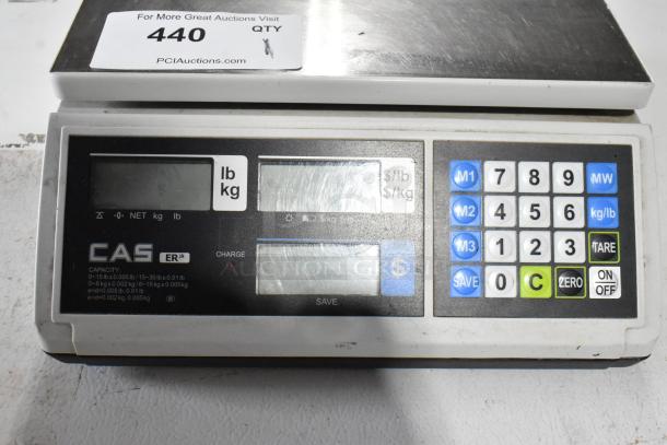 2018 CAS ER JR (CB) Countertop Food Portioning Scale with digital display, numeric keypad. Capacity and weight details visible.