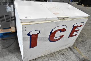 Frigidaire GLFC1526FW5 metal chest freezer, 115V, 1 phase, worn exterior with “ICE” lettering, auction tag visible.