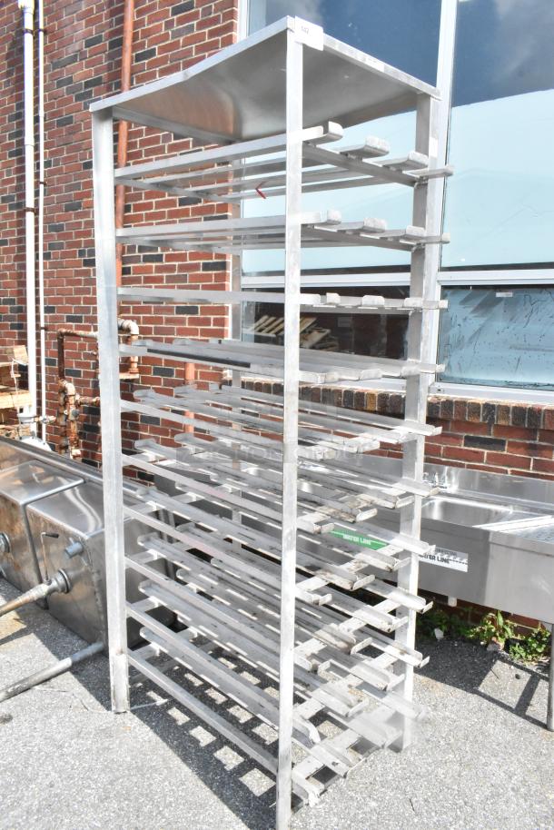 Servolift Eastern metal #10 can rack, multi-shelf, stainless steel, used condition, ideal for commercial kitchens.