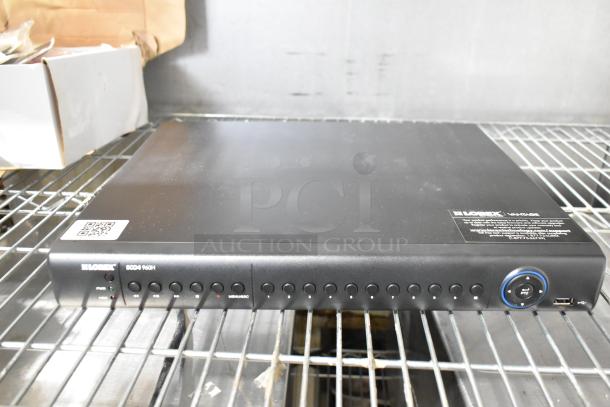 Lorex digital video recorder model ECO4-960H, in used condition, with control buttons and USB port, included in security lot.
