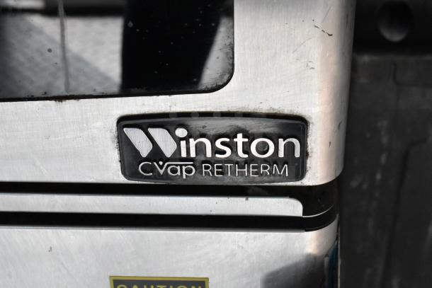 Winston CVap Retherm appliance in stainless steel. Close-up of the brand logo and caution label. Ideal for food trailer use.